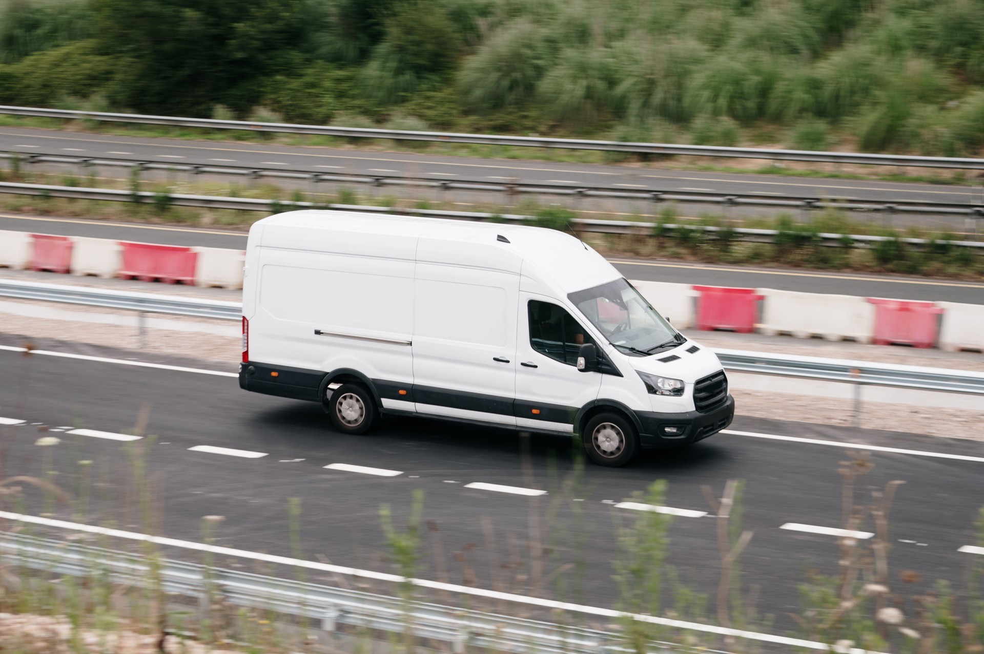 White van on a highway